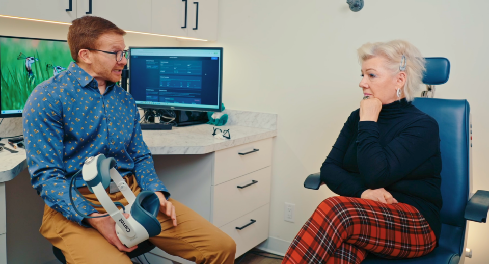 Dr. Brady Turner consults with a patient at Eye Gallery.