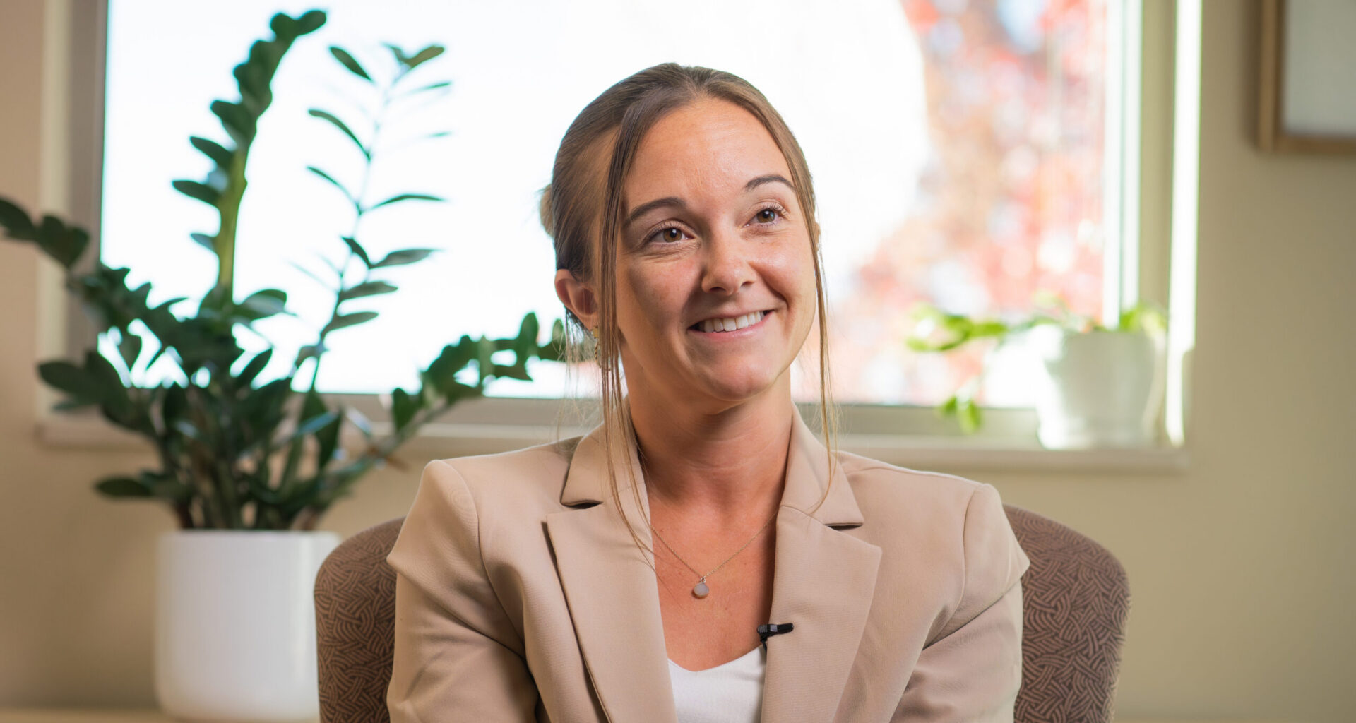 Ashton (Deal) Poe talks to the camera